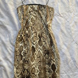 Snake skin print slip on dress size small very comfortable and stretchy